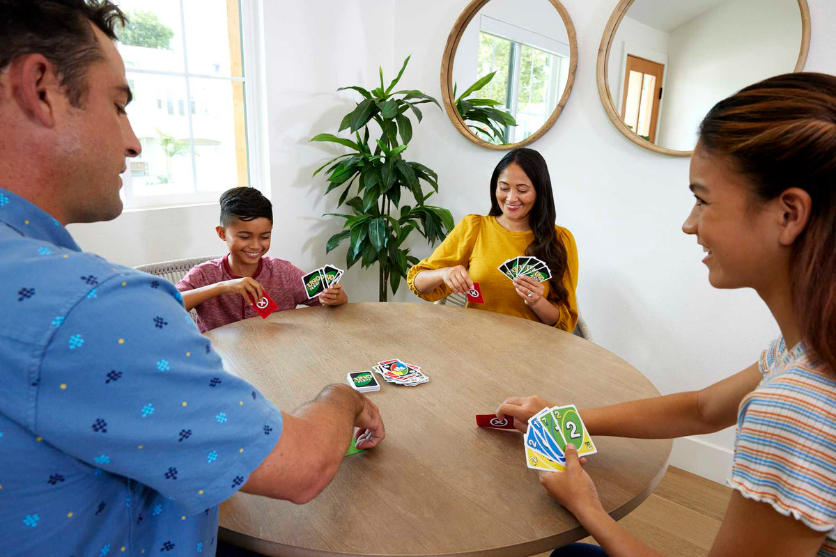 UNO Flex Card Game For Family Night Where Cards Change Color When Flexed in Collectible Tin Box